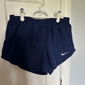 Blue Nike dri-fit adjustable running shorts